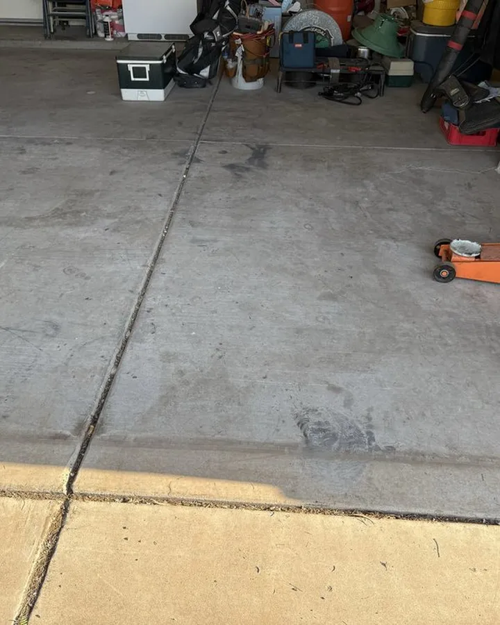 The same garage floor cleared and swept.